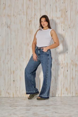  BAGGY STONE CON RECORTE COMBINADO Y BOTA DESCOCIDA RIGIDO